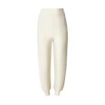 Perfect Moment Crystal Merino Wool Jogger in Cream | Sweatpants | Coveti