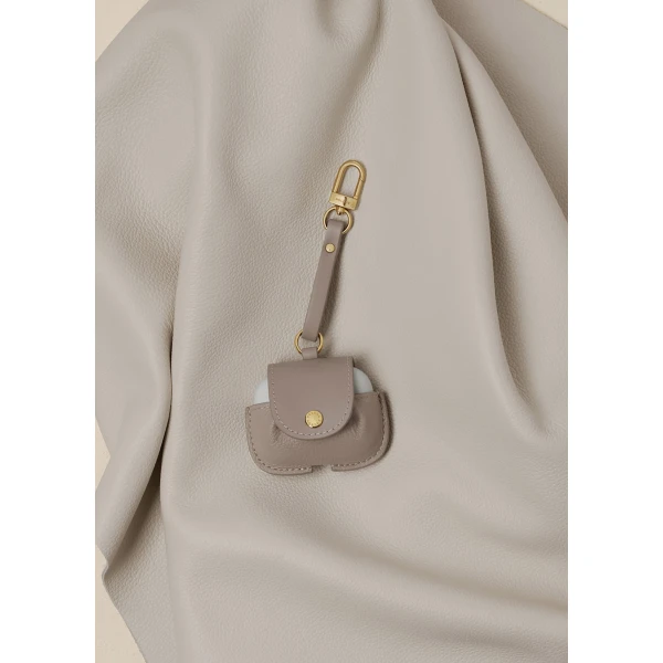 Polène AirPods Case in Duo Taupe, view 2 | Phone Cases | Coveti