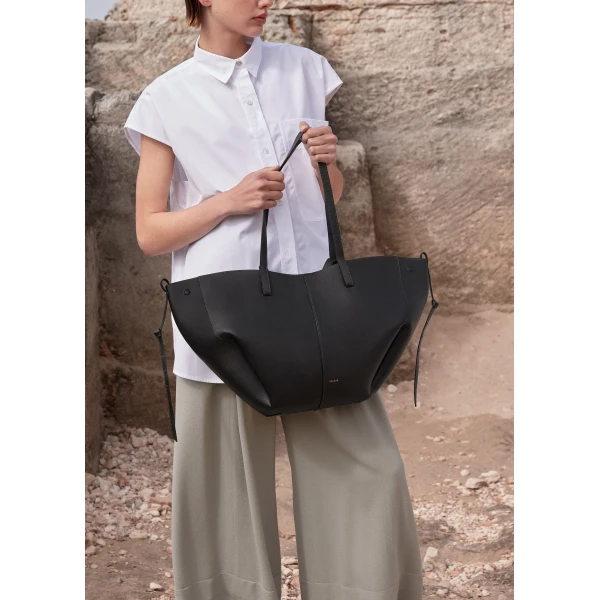 Polène Cyme in Textured Black Bag, view 2 | Totes & Top-Handle Bags | Coveti