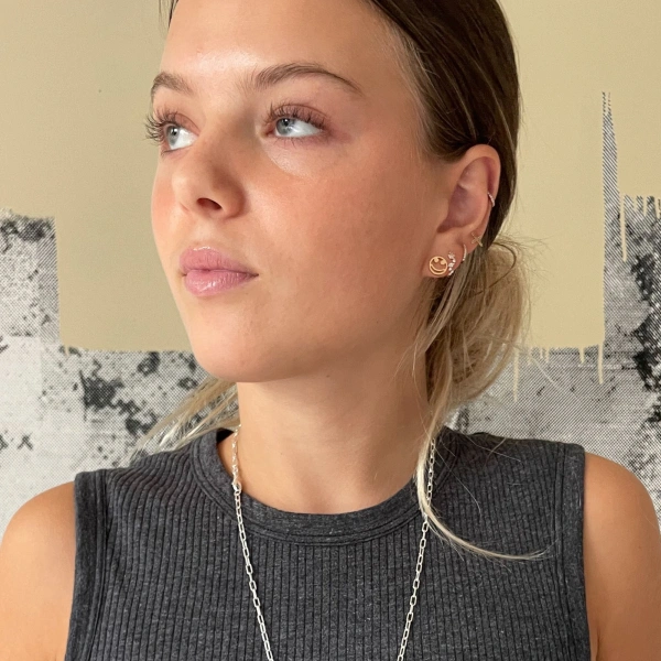 Rosa de la Cruz Cascade Eternity Mini Hoops in 18K Rose Gold, White Diamond, Pair | Fine Earrings | Coveti