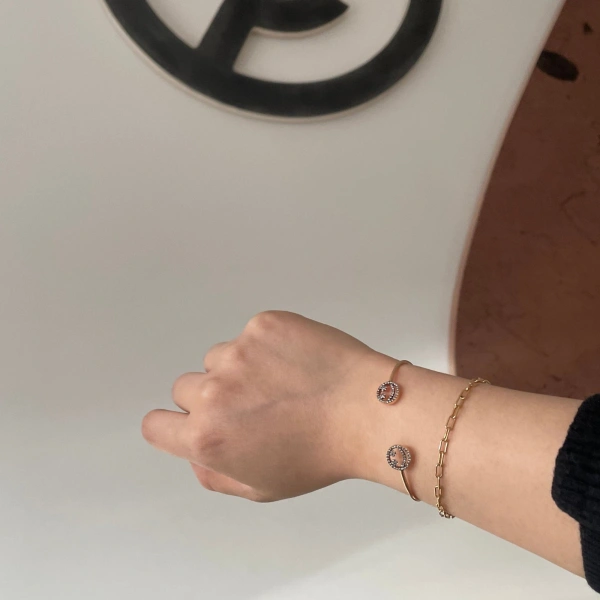 Rosa de la Cruz Double Smile Bangle in 18K Yellow Gold and Brown Diamond | Fine Bracelets | Coveti