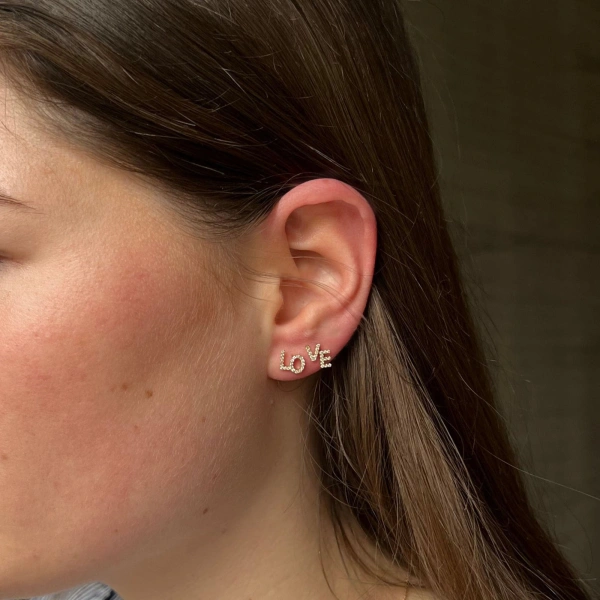 Rosa de la Cruz Love Text Studs in 18K Yellow Gold, White Diamond, Pair | Fine Earrings | Coveti