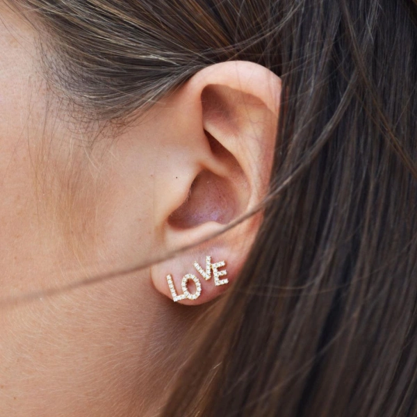 Rosa de la Cruz Love Text Studs in 18K Yellow Gold, White Diamond, Pair | Fine Earrings | Coveti