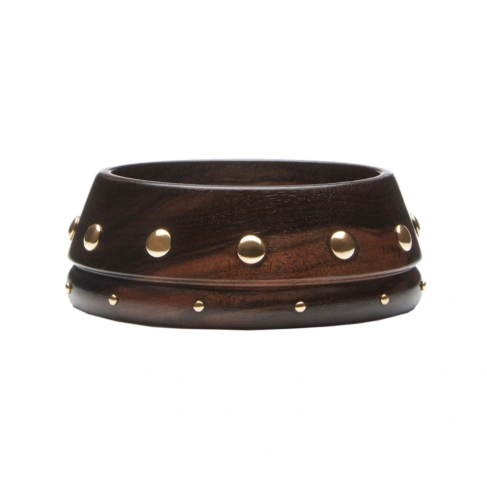Rosa de la Cruz Tapered Ebony Bangle in Ebony, 18K Yellow Gold, Double Studs Rosa de la Cruz Tapered Ebony Bangle in Ebony, 18K Yellow Gold, Double Studs | Fine Bracelets | Coveti