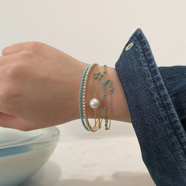 Rosa de la Cruz Turquoise Eternity Bangle in 18K Yellow Gold, Turquoise | Fine Bracelets | Coveti