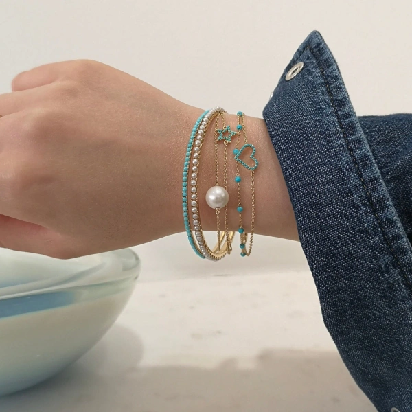 Rosa de la Cruz Turquoise Heart Charm Bracelet in 18K Yellow Gold, Turquoise | Fine Bracelets | Coveti