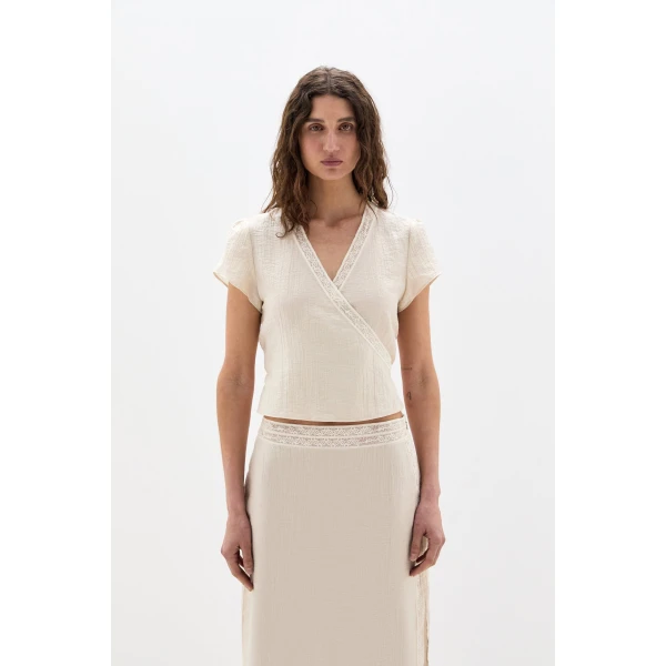 SIR the Label Nora Wrap Top in Cream | Tops | Coveti