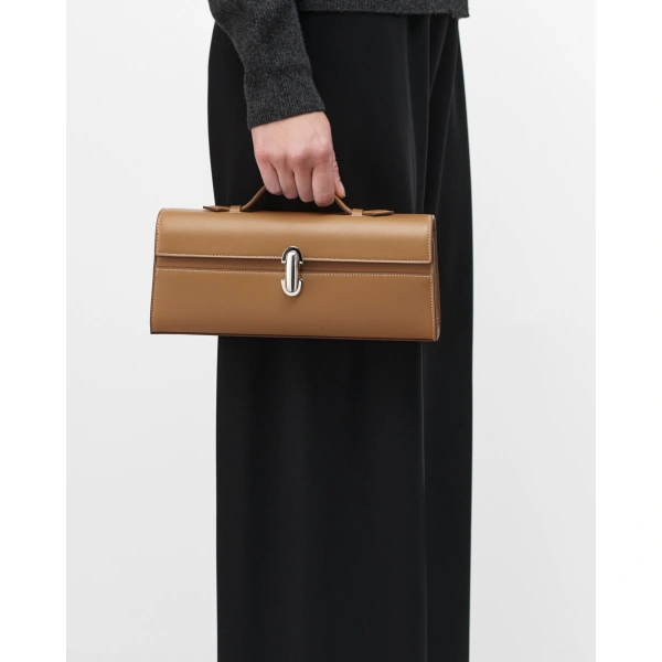Savette Slim Symmetry Pochette in Saddle Smooth Leather, view 4 | Totes & Top-Handle Bags | Coveti