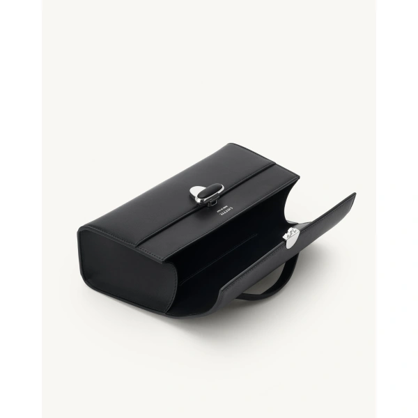 Savette Symmetry Pochette with Leather-Inset Lock in Black, view 3 | Totes & Top-Handle Bags | Coveti