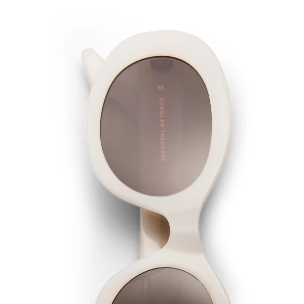 Scanlan Theodore Modern Oval Sunglasses in Milky Beige | Sunglasses | Coveti