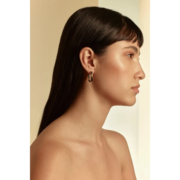Scanlan Theodore Petra Huggie Hoops in Light Gold | Earrings | Coveti