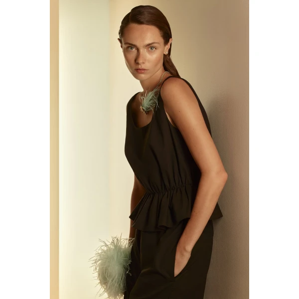Scanlan Theodore Polished Voile Peplum Top in Black | Tops | Coveti
