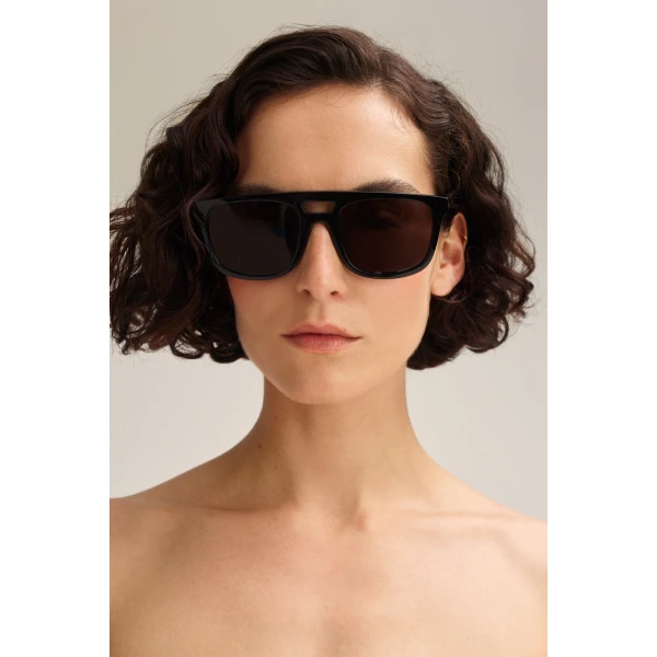 Scanlan Theodore Slim Aviator Sunglasses in Black | Sunglasses | Coveti