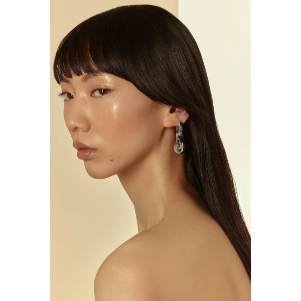 Scanlan Theodore Wishbone Huggie Earrings in Silver | Earrings | Coveti