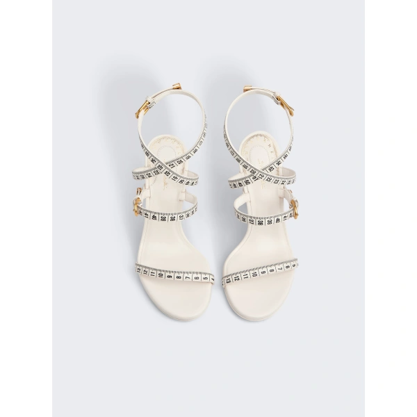 Schiaparelli Measuring Tape Heeled Sandals in White | Sandals | Coveti