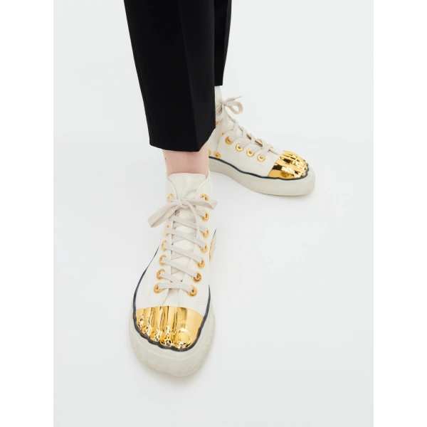 Schiaparelli Trompe L'Oeil Sneakers in Ecru | Sneakers | Coveti