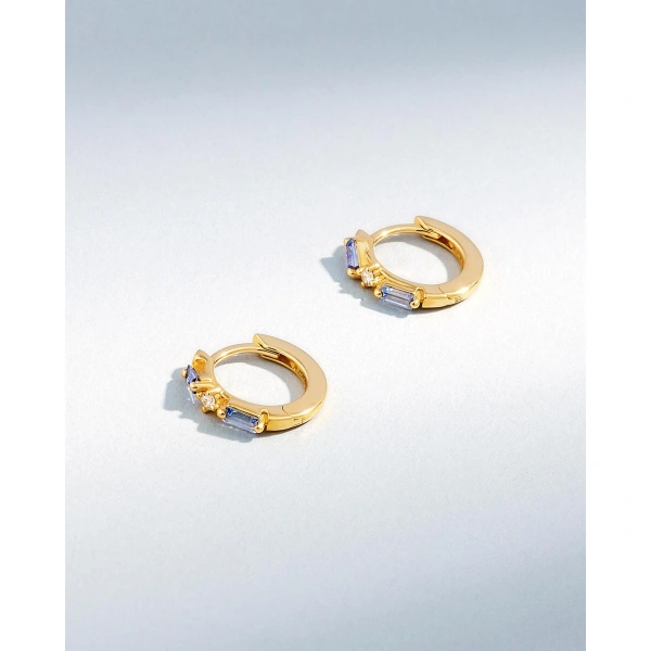 Suzanne Kalan Thin Mix Light Blue Sapphire Huggies in 18K Yellow Gold | Fine Earrings | Coveti