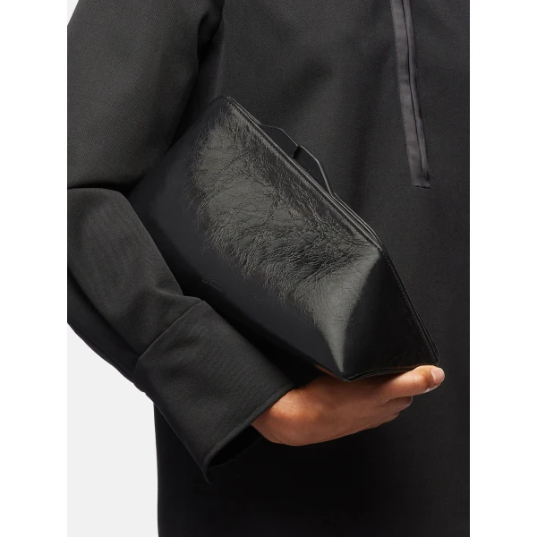 The Attico 8.30PM Oversized Clutch in Black Crackled Leather | Clutch Bags | Coveti