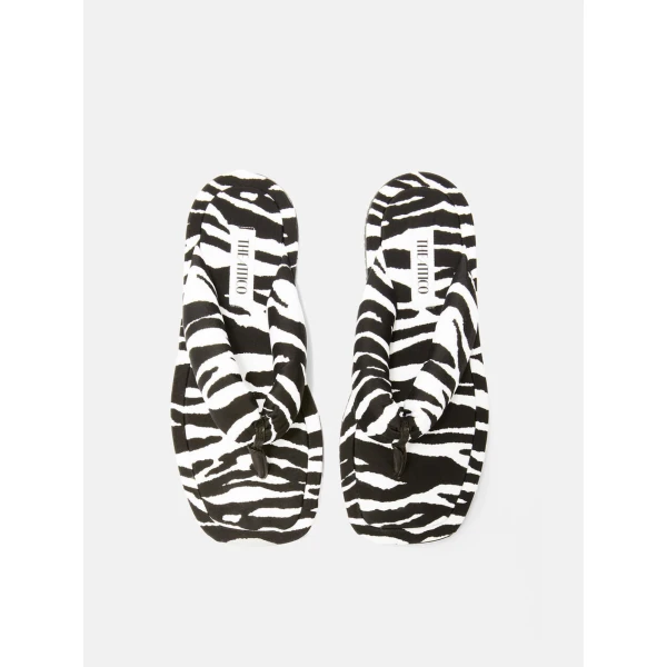 The Attico Indie Flat Thong Sandals in White and Black | Flats | Coveti