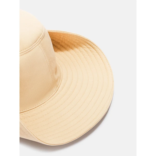 The Attico Logo Bucket Cap in Faded Ecru | Hats | Coveti
