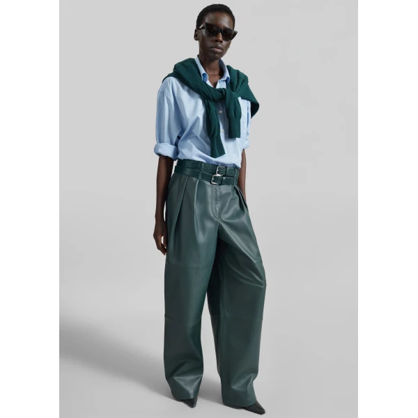 The Frankie Shop Jeva Faux Leather Double Belt Loop Trousers in Bottle Green, view 2