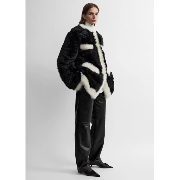 Toteme Silky shearling pocket jacket in Black / Natural, view 3
