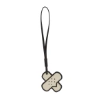 Valextra Bandaid Charm in Pergamena White and Black | Bag charms | Coveti