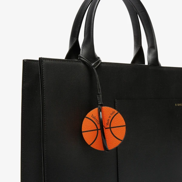 Valextra Basketball Charm in Orange and Black | Bag charms | Coveti