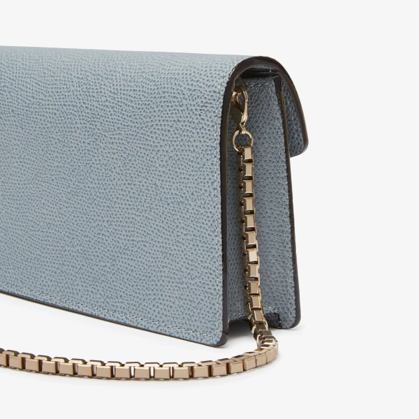 Valextra Iside Clutch with Chain Bag in Niagara Blue | Clutch Bags | Coveti