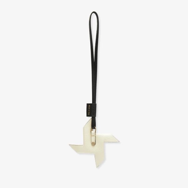 Valextra Pinwheel Charm in Black and Pergamena White | Bag charms | Coveti
