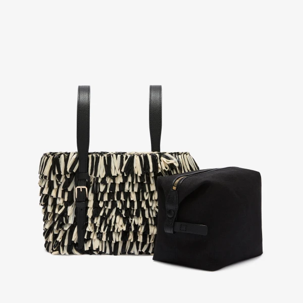 Valextra Soft Wavy Raffia Bucket Bag in Black and Pergamena White | Bucket Bags | Coveti