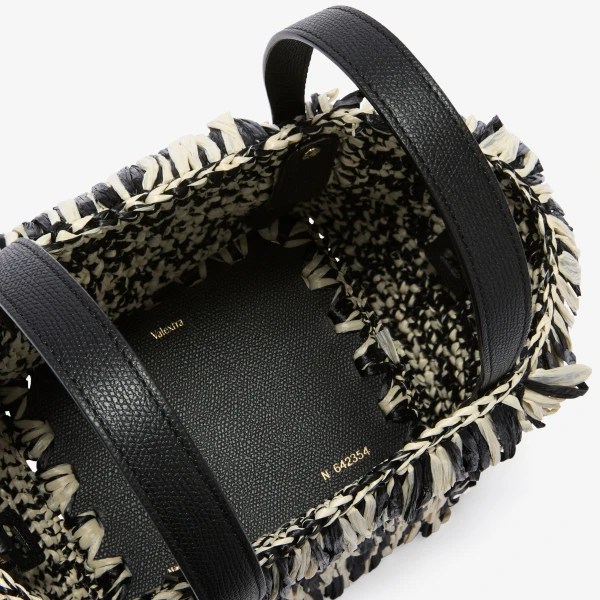 Valextra Soft Wavy Raffia Bucket Bag in Black and Pergamena White | Bucket Bags | Coveti