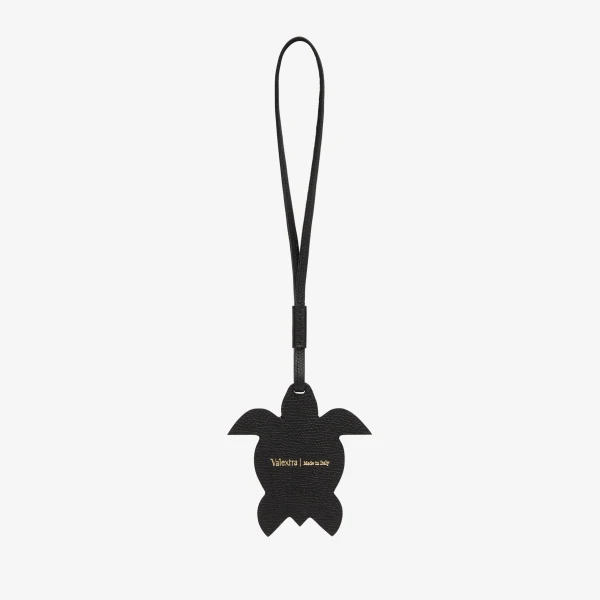 Valextra Turtle Charm in Pergamena White and Black | Bag charms | Coveti