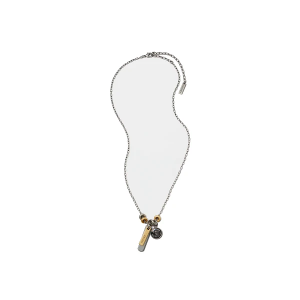 Versace Logo Tag Necklace in Silver and Gold | Necklace | Coveti