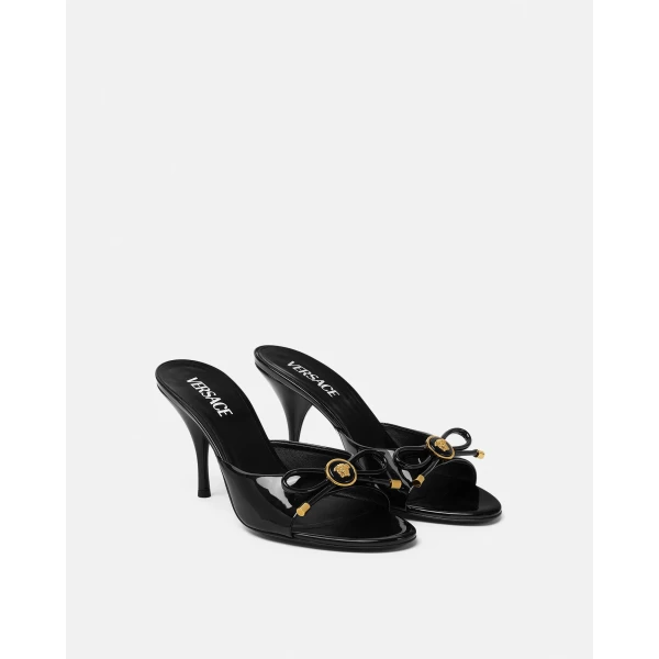 Versace Opera Bow Patent Mules 85 mm in Black and Gold, view 2 | Mules