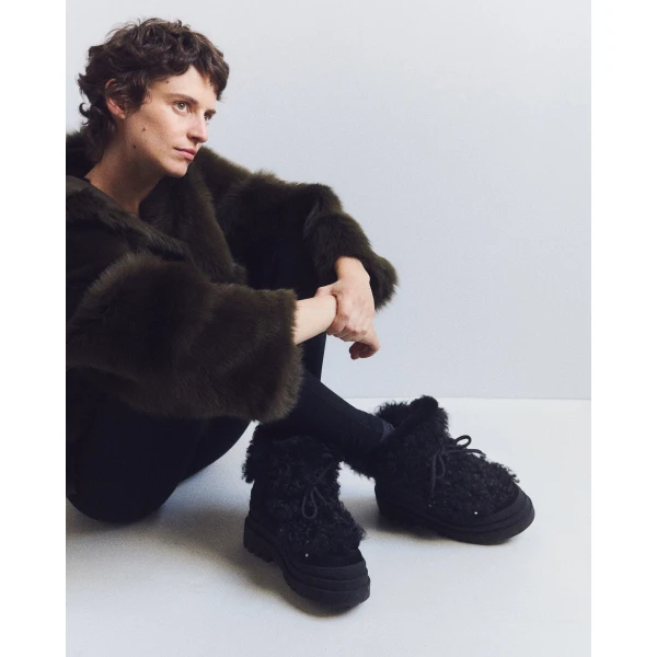 Yves Salomon Merino Lambskin Shearling Boots in Black | Boots | Coveti