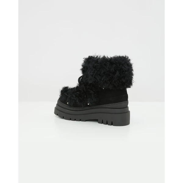 Yves Salomon Merino Lambskin Shearling Boots in Black | Boots | Coveti