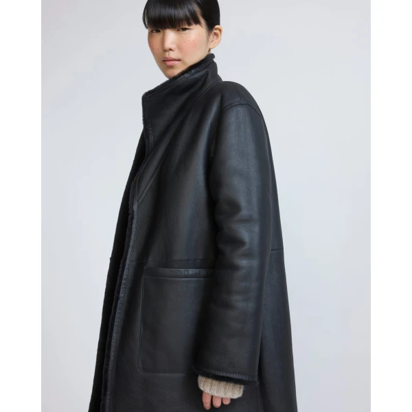 Yves Salomon Reversible Combed Lambskin Shearling Coat in Black | Shearling Coat | Coveti