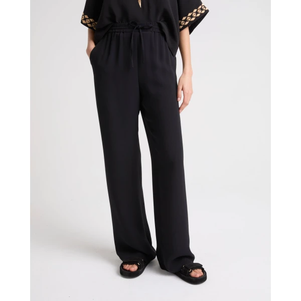 Yves Salomon Silk Crepe Palazzo Trousers in Black | Wide leg pants | Coveti